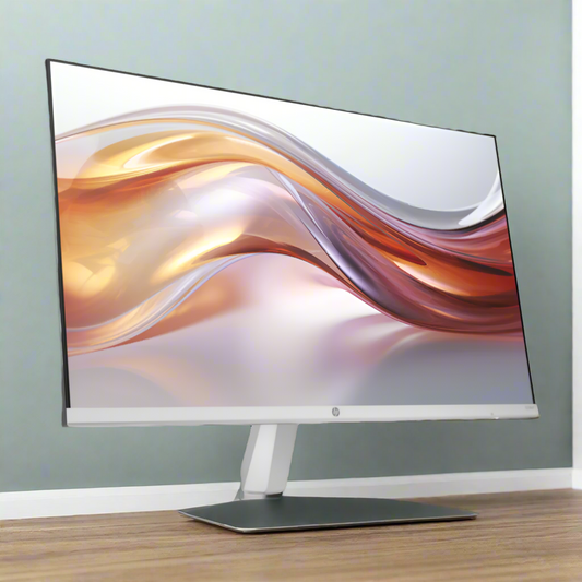 Computer monitor with a colorful display on a white background